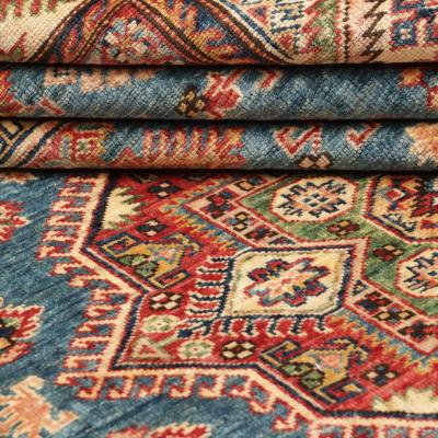 Detail view of Kazakh carpet with geometric pattern in traditional Caucasian knotting art.